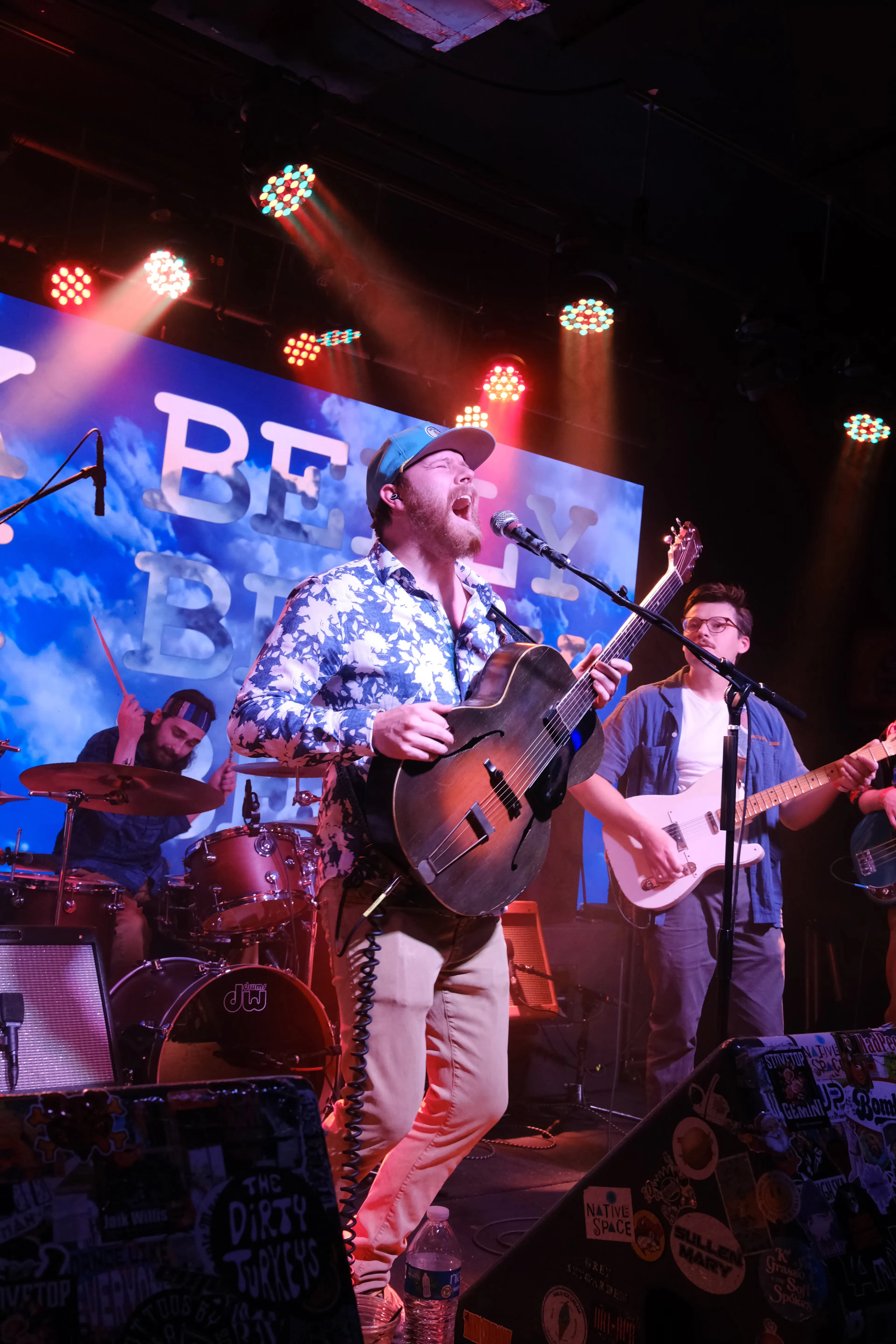 Pork Belly rock band performing live music at an event